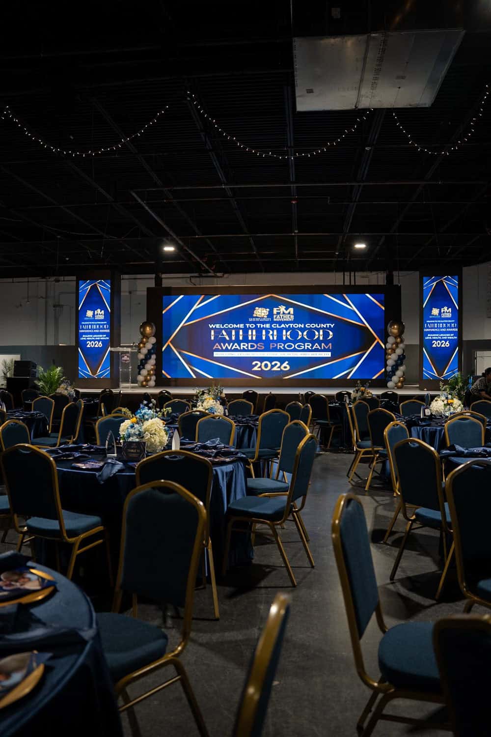 Event venue with stage and seating for awards ceremony in 2026.