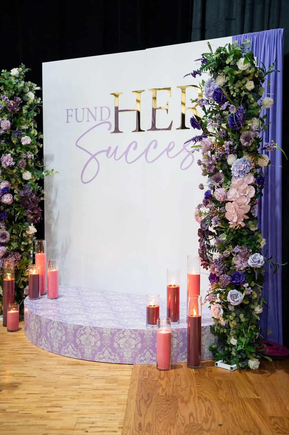 Decorative floral display at fundraising event for success.